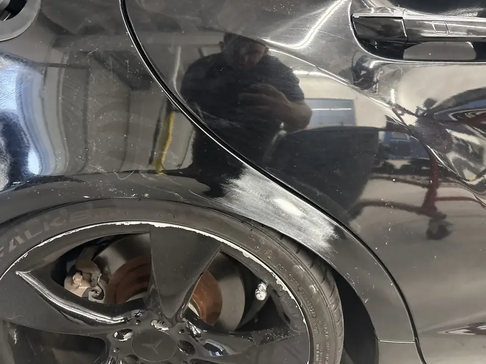 During: right quarter panel and wheel arch of the 2013 Mercedes-Benz CLS550 being prepped