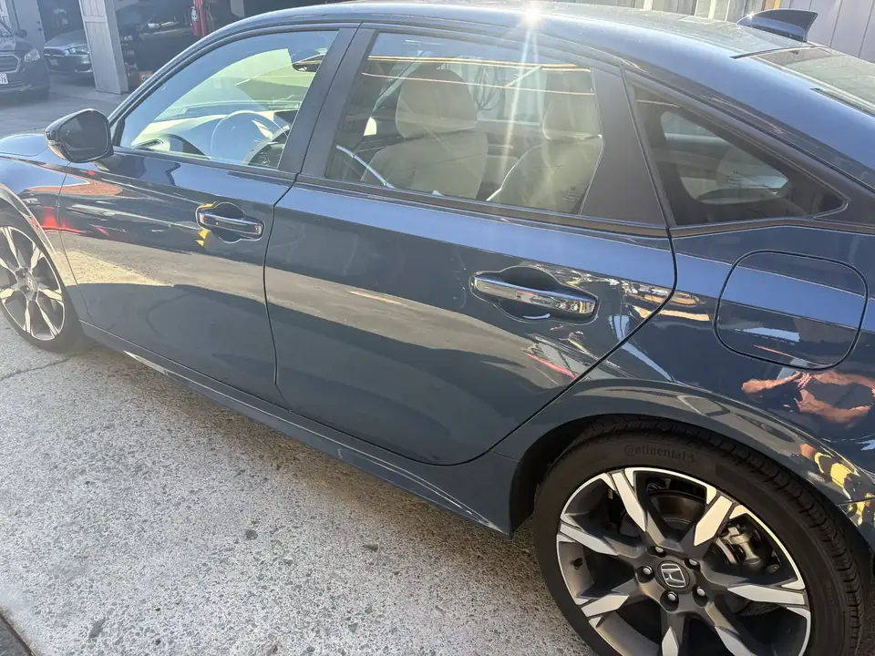 After: 2025 Honda Civic left front and rear doors after repair and refinish
