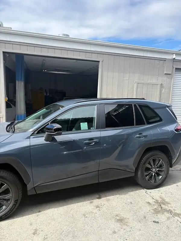 After: new left front and rear doors on the 2026 Toyota RAV4 XLE after refinishing