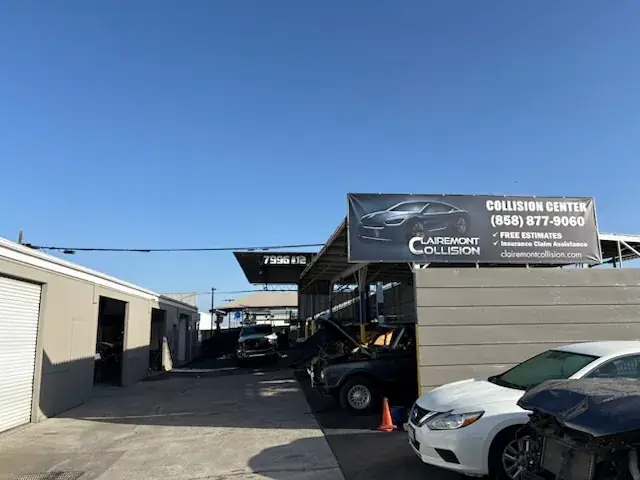 Clairemont Collision shop entrance and Collision Center sign on Armour St in San Diego