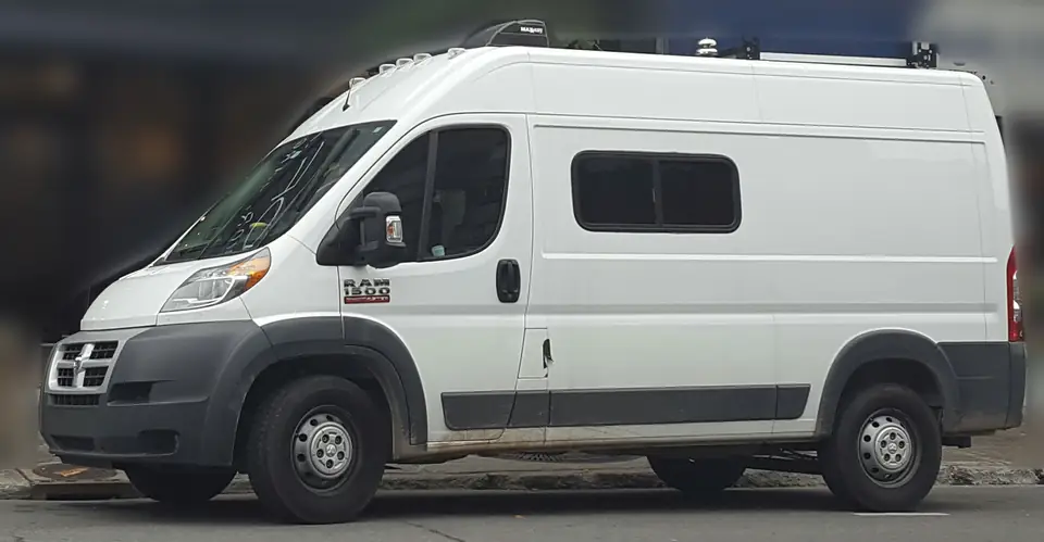 Side view of a white Ram ProMaster cargo van